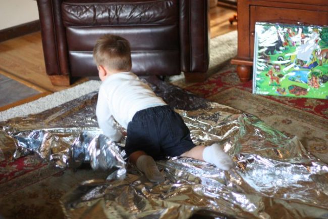 Baby and Toddler Activity:  Fun with an Emergency Mylar Blanket