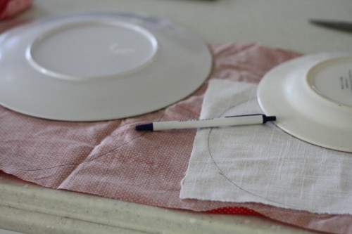 trace a circle onto the red fabric