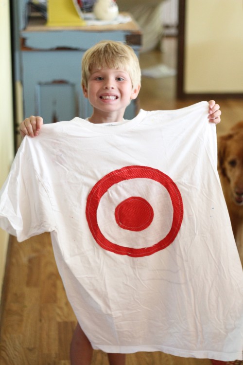 showing off Dad's shirt